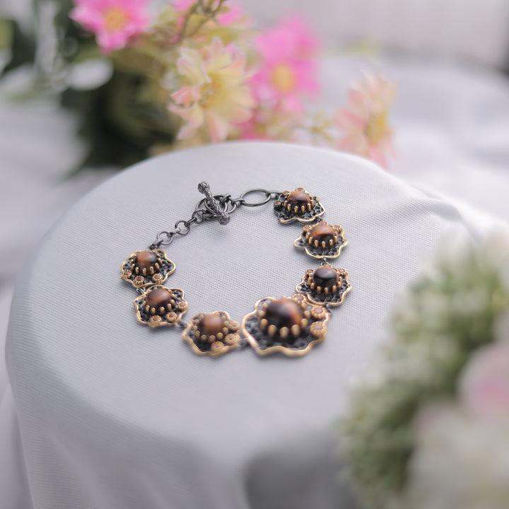 A Tiger Eye Bracelet showcasing its golden-brown gemstone beads.