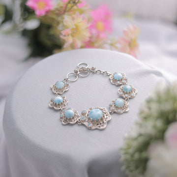 A Larimar Bracelet showcasing its sky-blue natural hues.