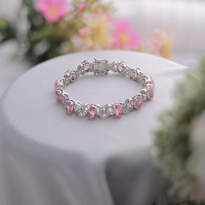 A stunning Peach Oval Cut Bracelet with Swarovski diamonds.