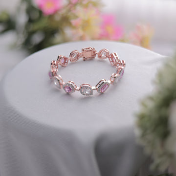 A Pink Emerald & Pear Cut Bracelet with shimmering Swarovski diamonds.