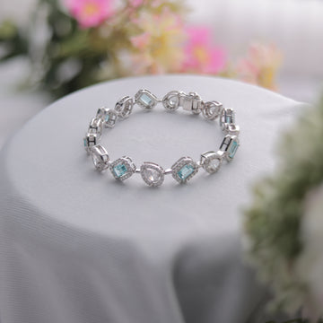 A dazzling Aqua Blue Swarovski Diamond Bracelet, featuring a combination of cuts.
