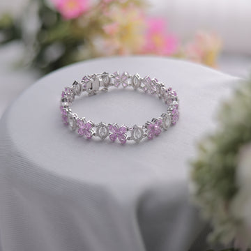 A Pink Floral Bracelet with Swarovski diamond.