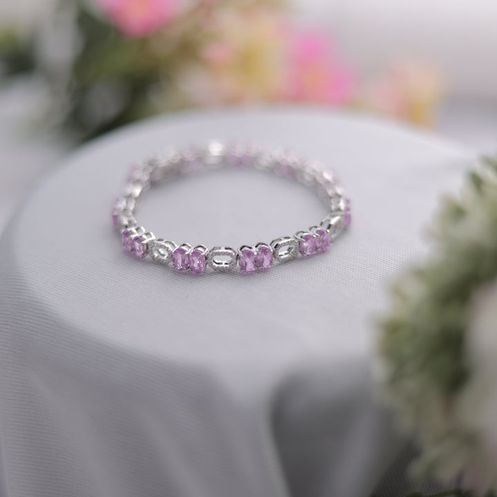 A 925 Sterling Silver Bracelet with oval-cut gemstones.