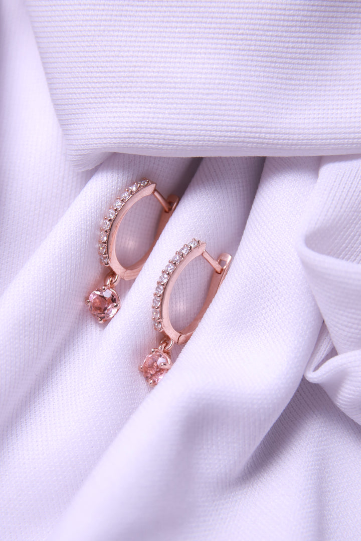 A beautiful pair of Peach Hoop Dangling Earrings in a sleek 925 silver finish.
