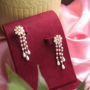 Elegant gold-plated Swarovski diamond and pearl earrings, designed for a timeless look