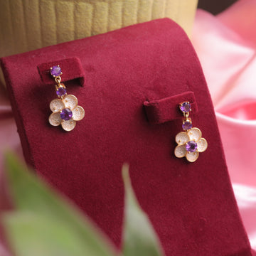  Close-up of Amethyst Floral Earrings crafted in 925 silver with a delicate floral design.