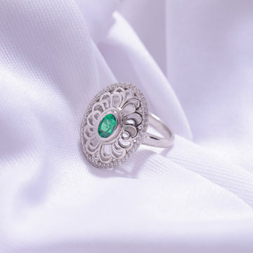 Close-up of Oval Cut Green Ring – elegant design with a vibrant green gemstone